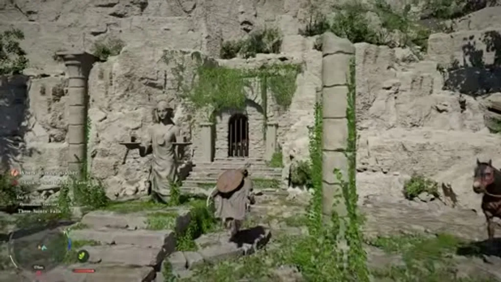 The hidden stone structure near the tutorial bridge in Crimson Desert, showing the ancient ruin building flanked by two stone statues and a barred gate that hides the Legionary's Gladius chest.