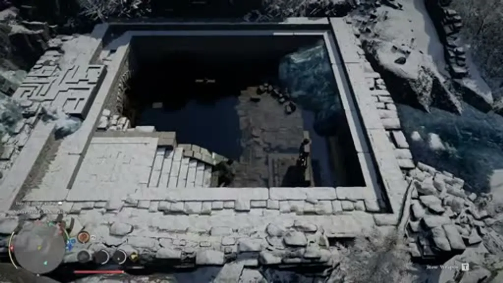 Top-down view of the stone pool at Silver Wolf Mountain Ancient Ruins in Crimson Desert, with the water half-drained and the windmill pump mechanism visible at the bottom.